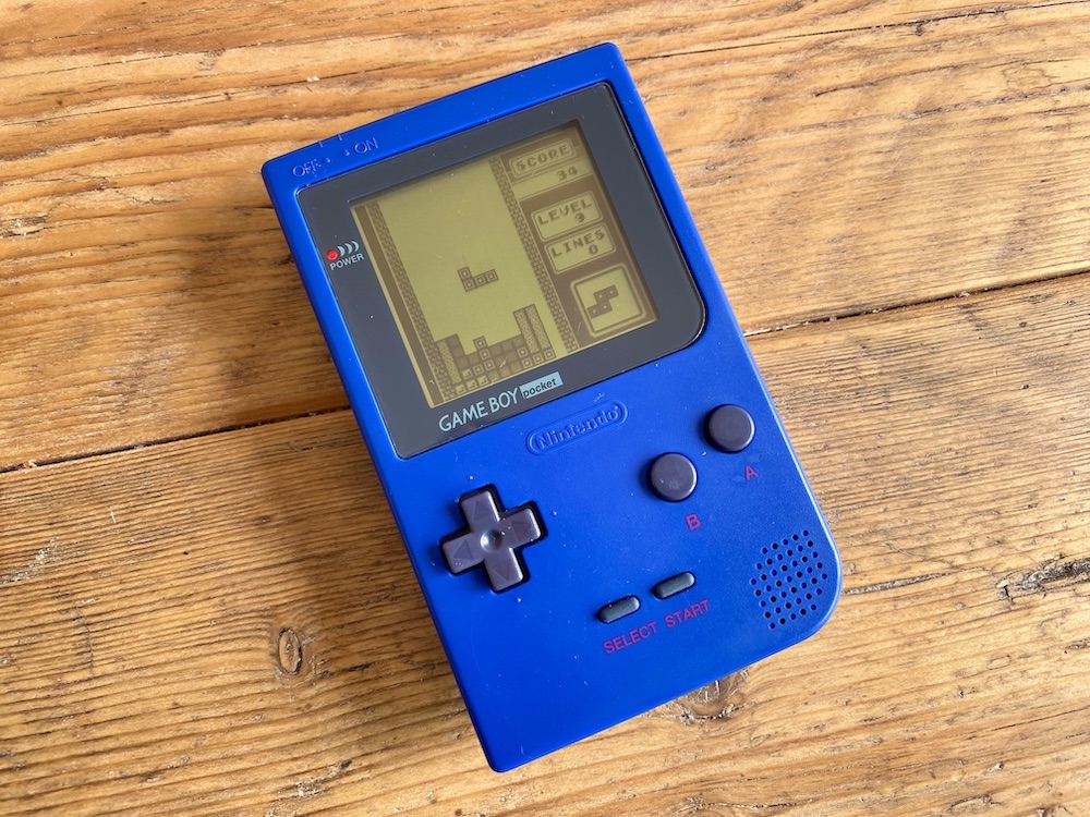 Game Boy Pocket Blue showing improved screen size and quality with Tetris running