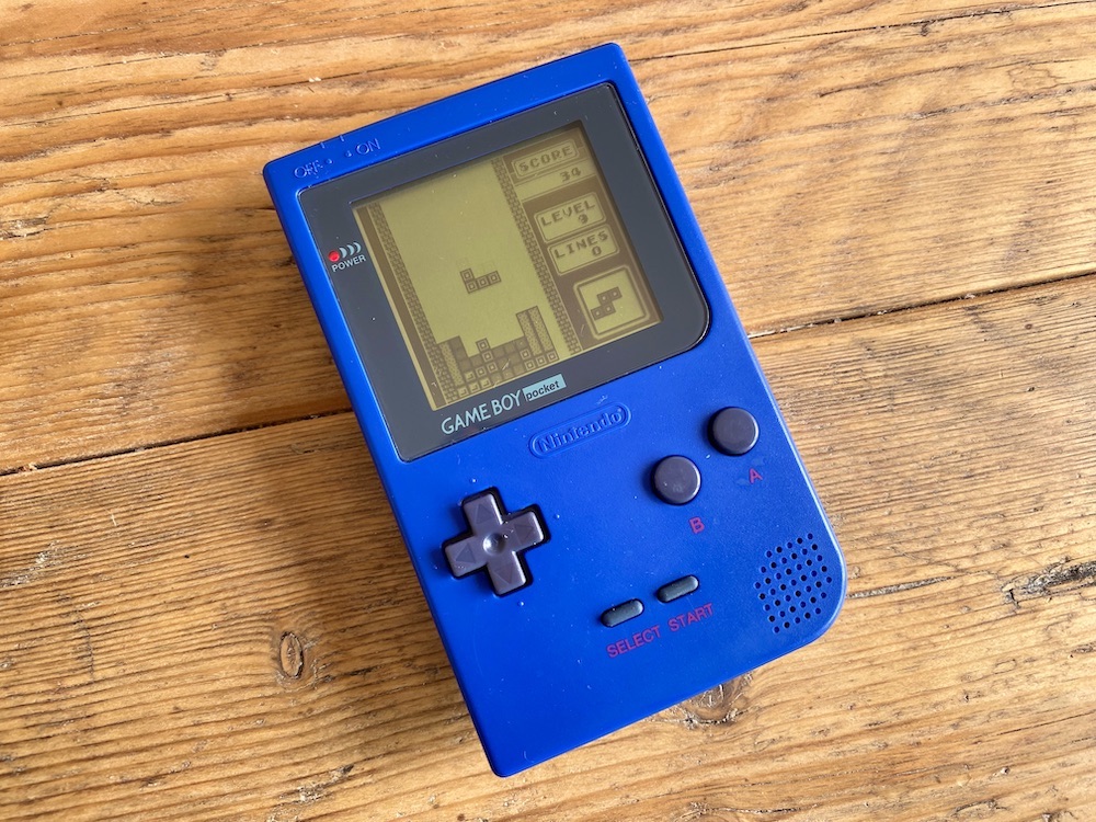 Game Boy Pocket Blue showing improved screen size and quality with Tetris running